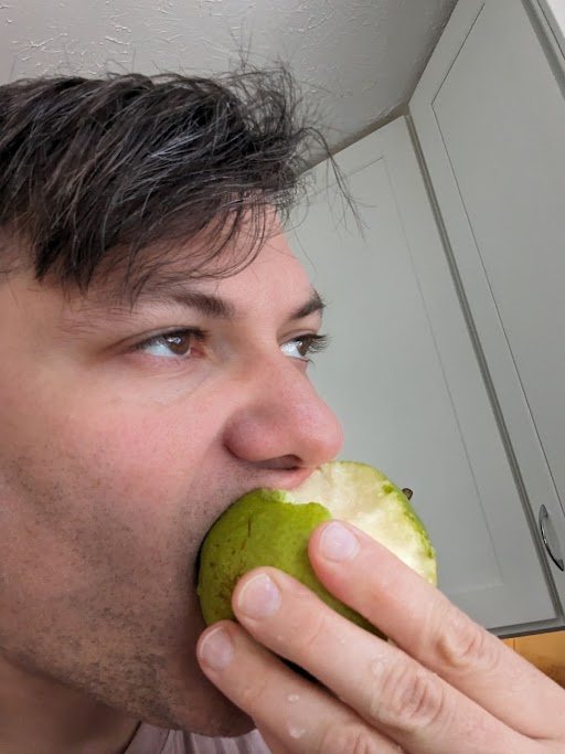 Man eating fruit